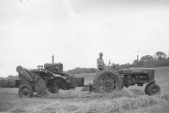 Alvin-W.-Tripp-bailing-hay