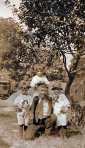 L-R Stanley Zembo, Joseph Ziemba, Walter Zembo, Josephine Zembo on father’s shoulders c. 1924-25